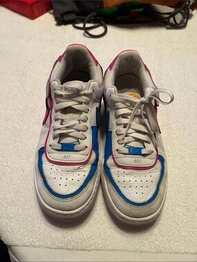 Nike White Sneakers with Blue and Pink Accents